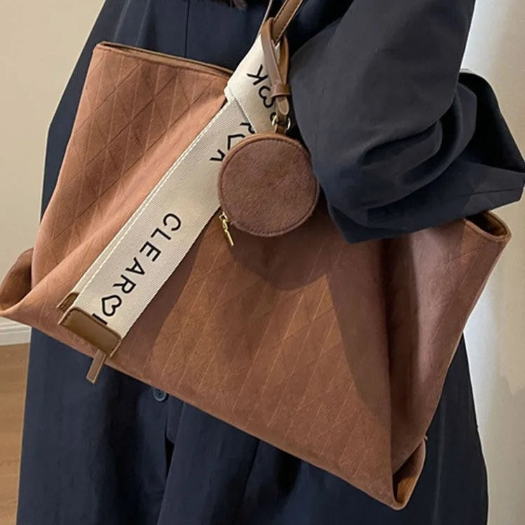 Large polyester shoulder tote bag in horizontal square shape with zipped compartment and sandwich pocket
