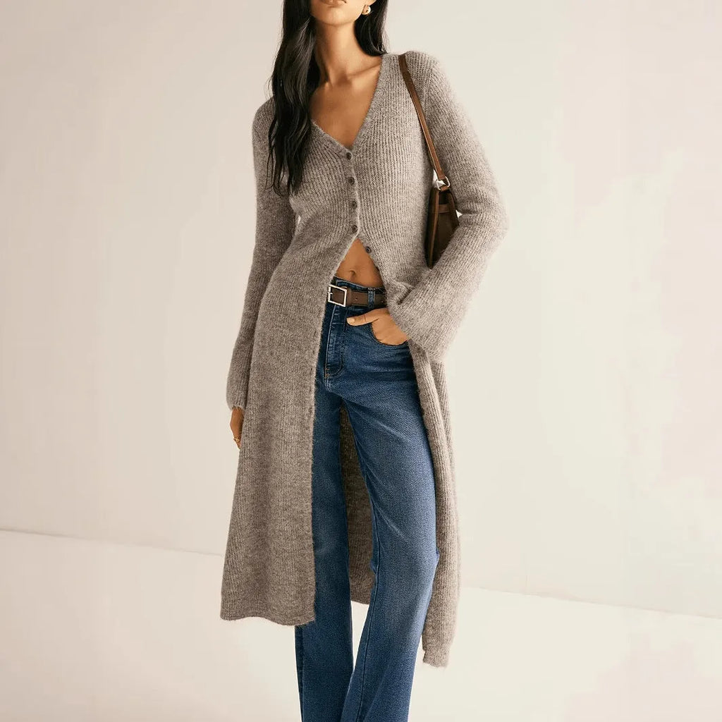 Khaki French retro long sleeve cardigan with button front on a model.
