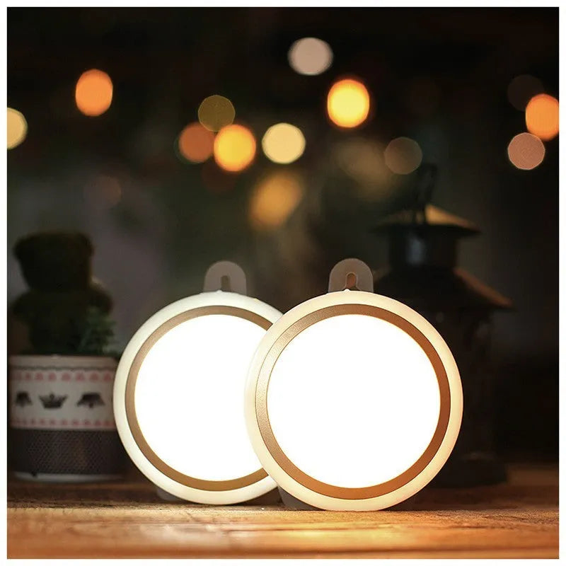 Smart body motion sensor LED night light with 80mm diameter showing warm and white light options
