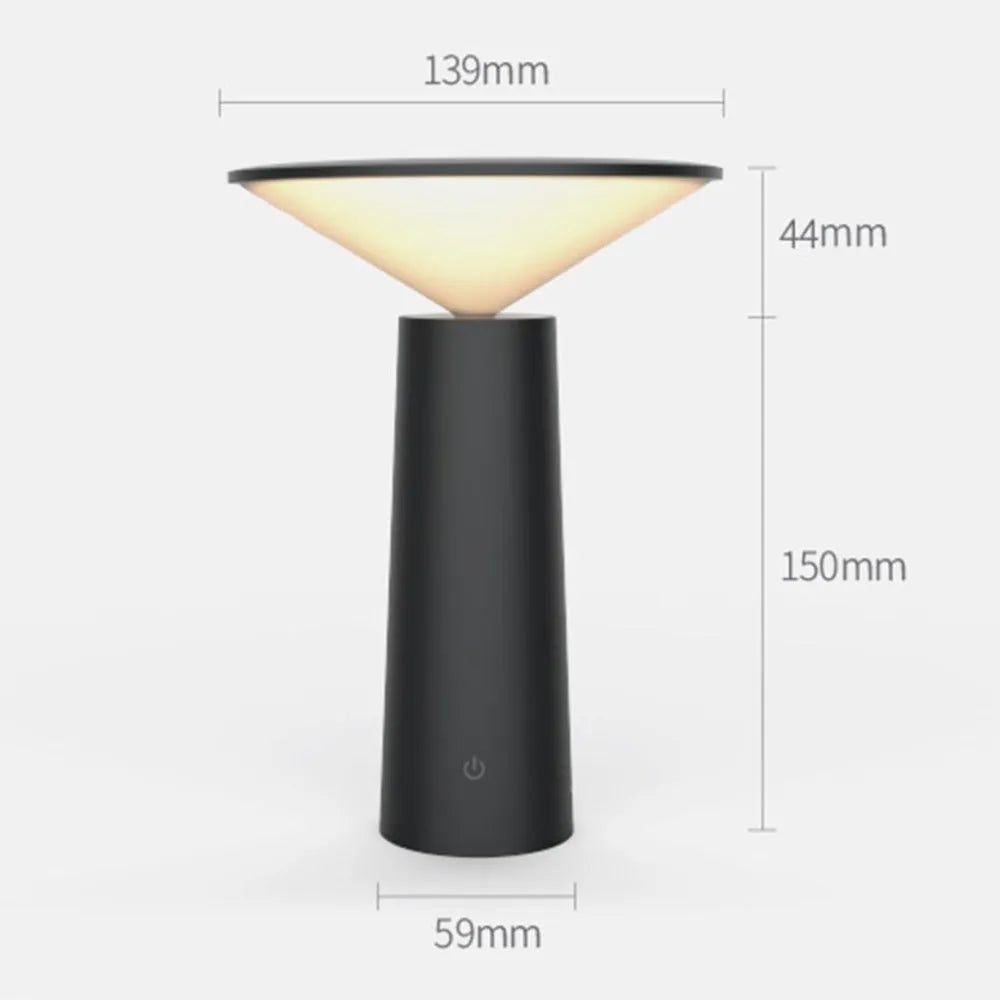 Black USB touch sensor reading lamp with tilted head on a wooden desk
