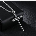 Titanium steel cross pendant necklace with steel nails motif, available in black golden silver colours