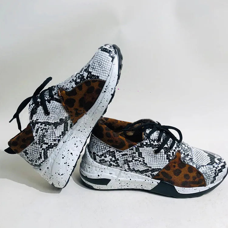 Women's casual suede sneakers with wedge heel in black, leopard, panther, pink, and snake pattern colours