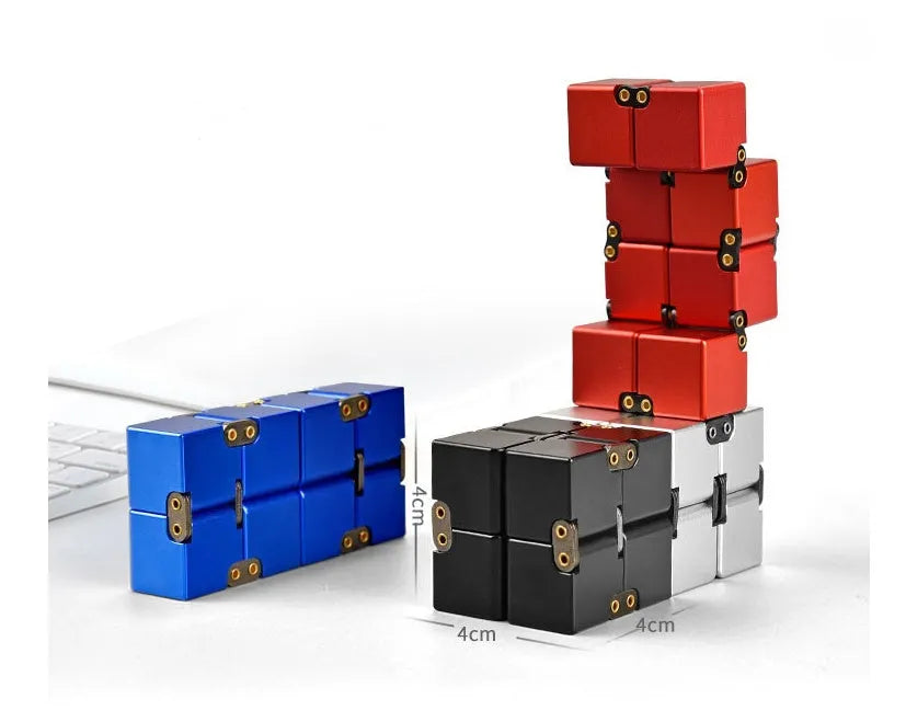 Zinc alloy infinity cube fidget toy in black, measuring 4cm, on a white background