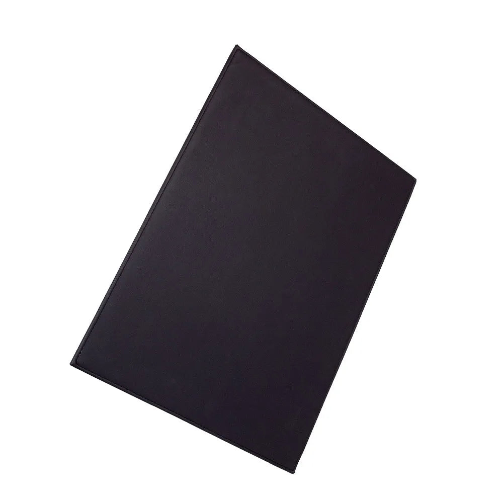 Heat-insulating laptop pad in black, gold, blue, and green colours on a desk