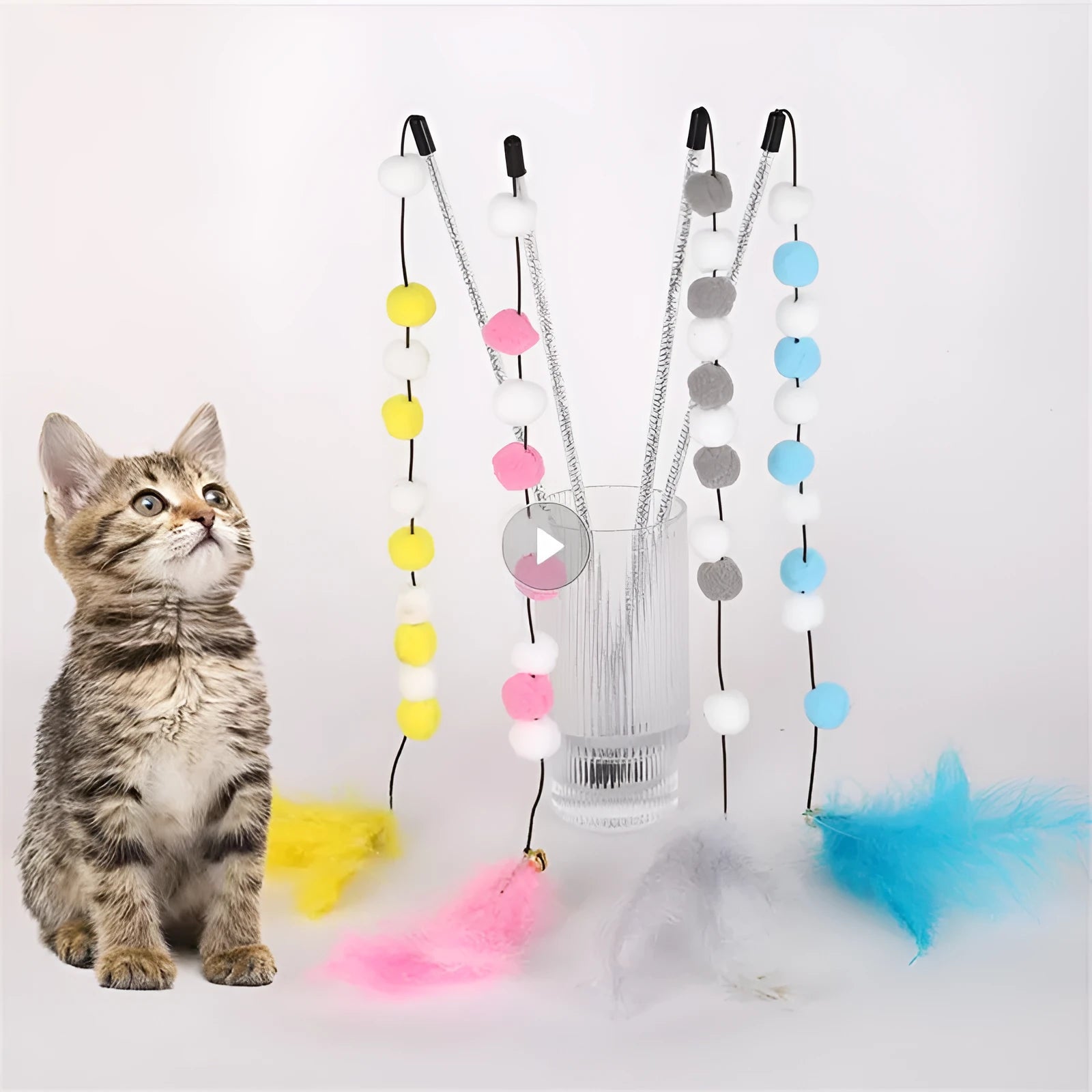 Colourful cat teaser toy rod with bell, feathers and pompons on 31cm stick