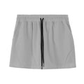 Men's thin grey polyester basketball shorts with an elastic waistband, shown in an athletic context.
