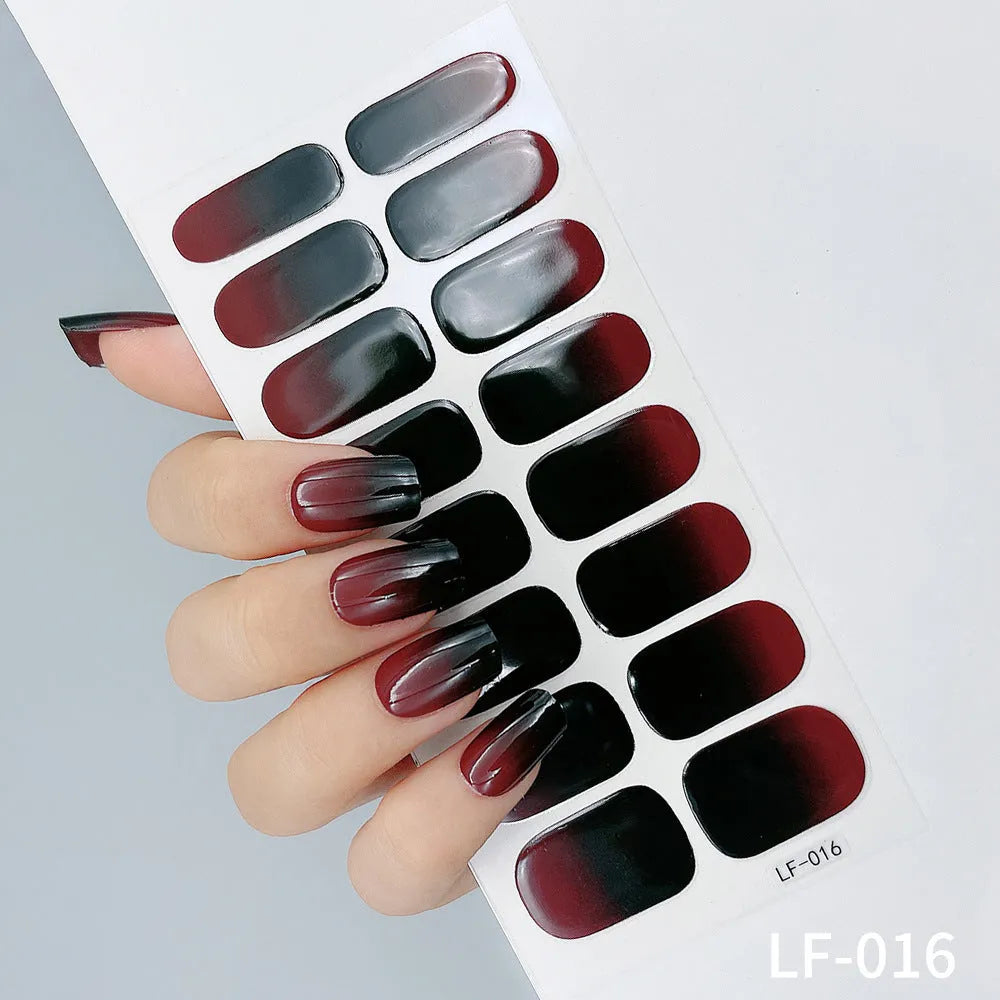 Full nail art sticker sheet showing 16 different solid colour designs including European simple nails and floral patterns