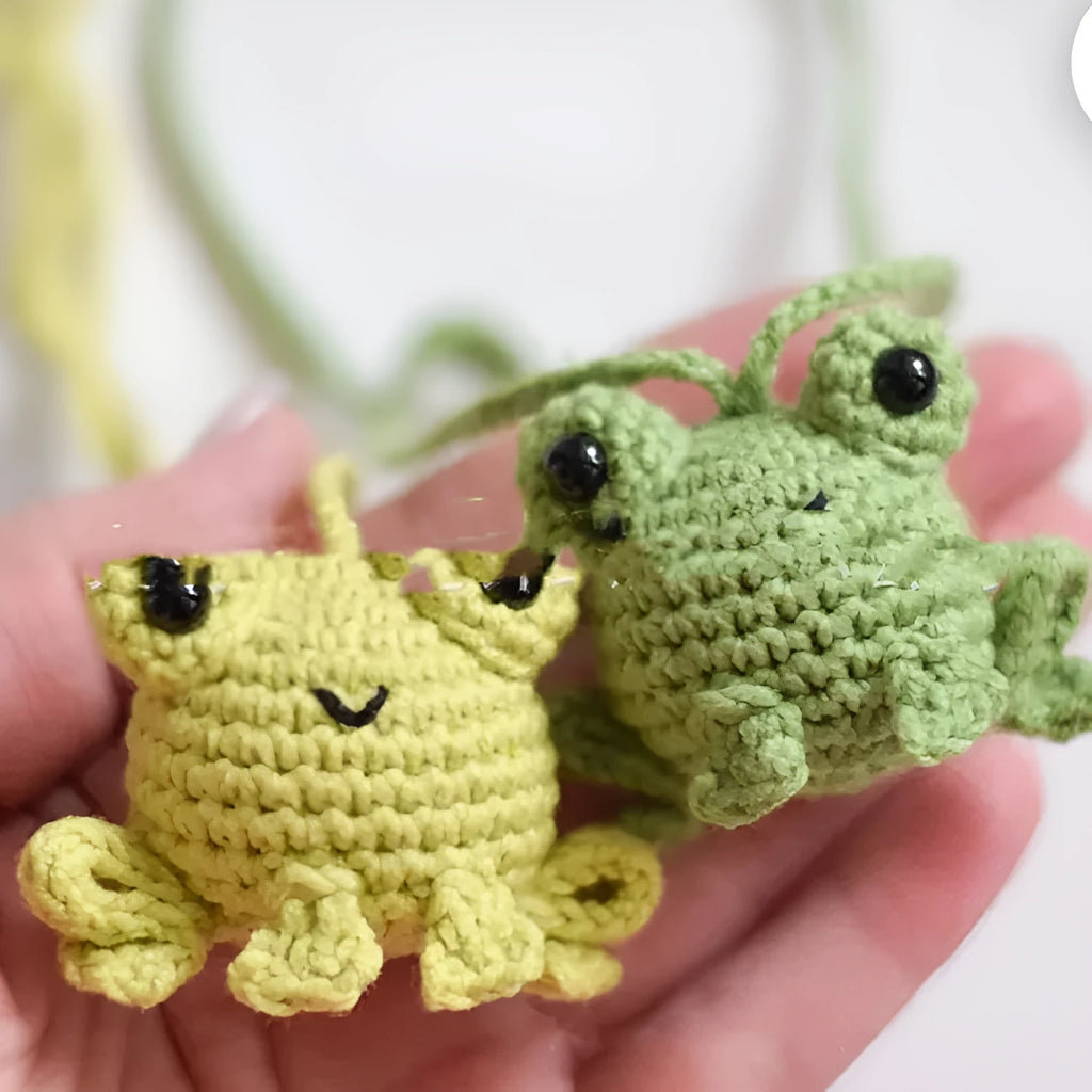 Handmade woven plush frog pendant for car interior in green, orange, grass green.