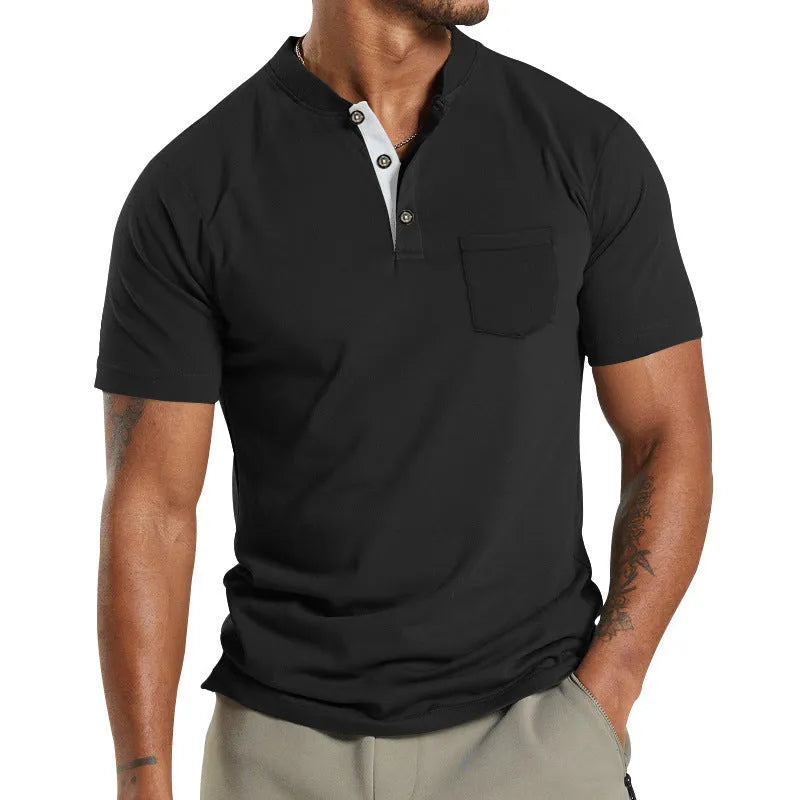 Plus size man wearing a light grey short sleeve casual shirt with a button chest pocket.