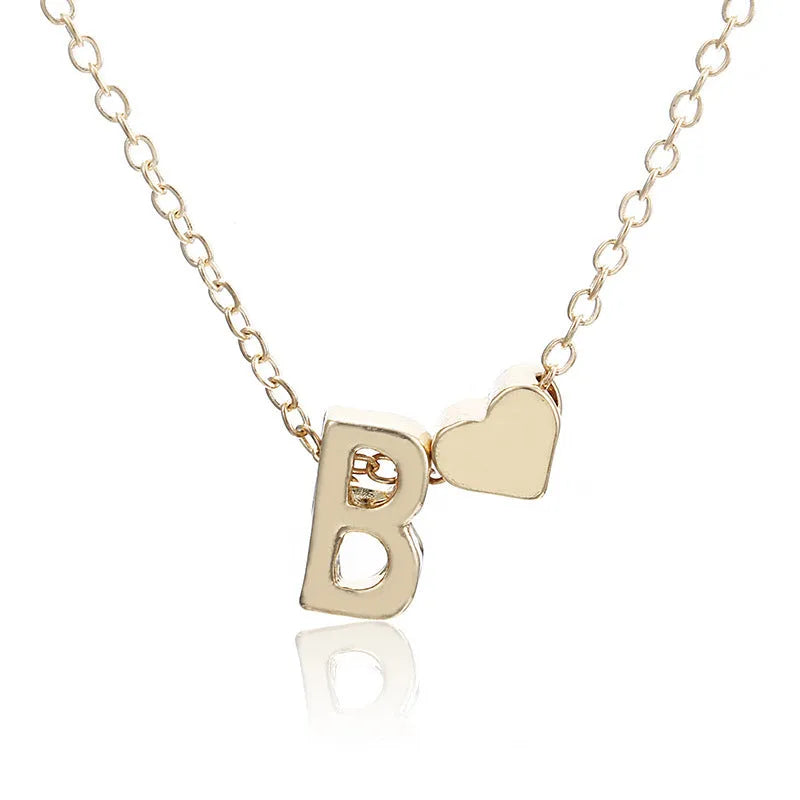 Gold and silver alloy peach heart shaped letter pendant necklace on a chain