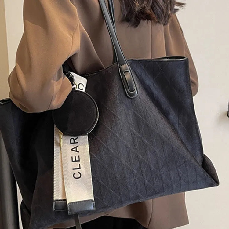 Large polyester shoulder tote bag in horizontal square shape with zipped compartment and sandwich pocket