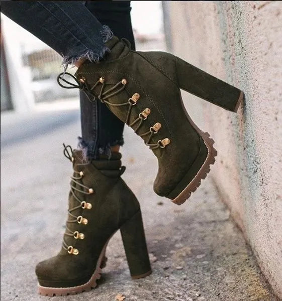 Women's suede ankle boots with thick heel in Roman style, showing decorative rivets and available in four colours
