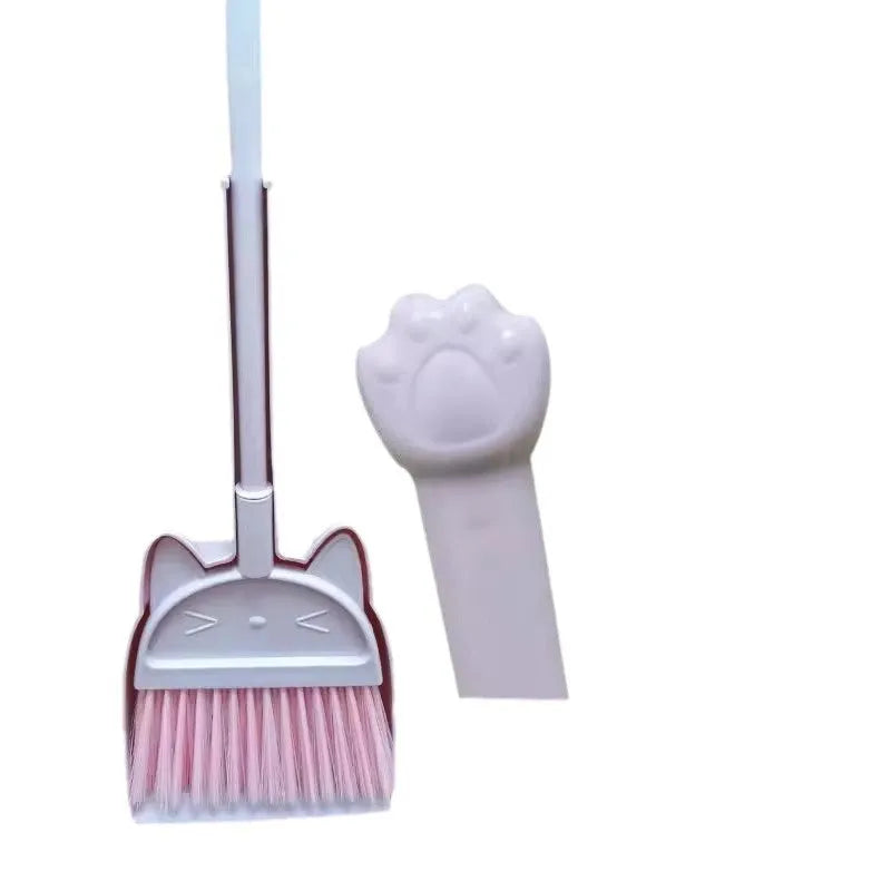 Purple broom and dustpan set with rotating head and brush holder