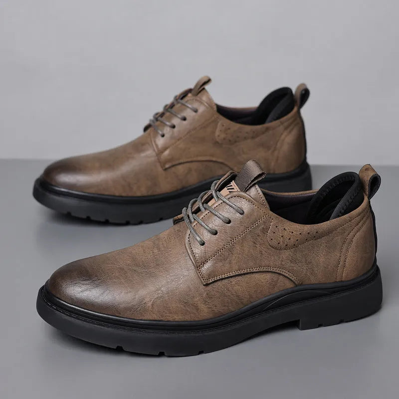 Men's black and brown leather sneakers with cowhide uppers and rubber soles
