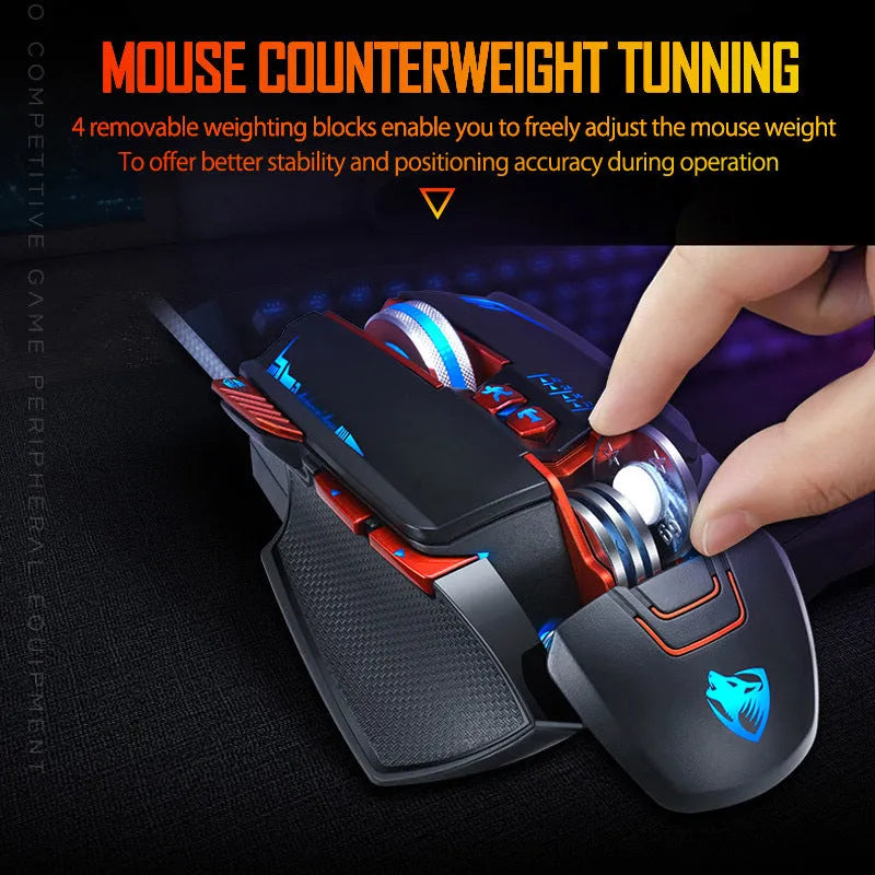 Thunder Wolf V9 black wired gaming mouse with six buttons and USB cable on gaming desk
