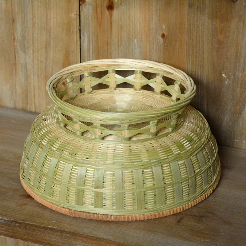 Handmade woven bamboo storage basket in natural colour with open top design