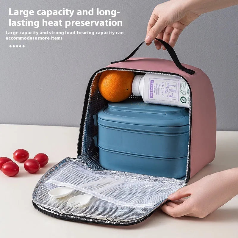 Textured cloth insulated lunch bag in sapphire blue colour with large capacity for a bento box.