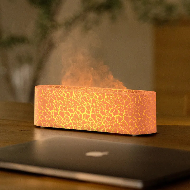 Square black lava flame aroma diffuser humidifier with USB cable on desktop