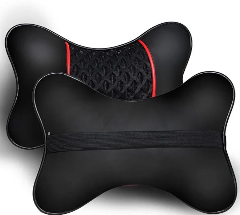 Car headrest neck pillow in black red colour with green leather exterior on a car seat
