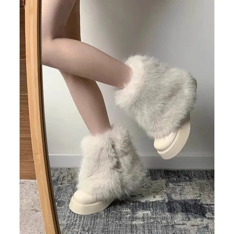 Women's black artificial plush snow boots with fleece lining and waterproof platform sole