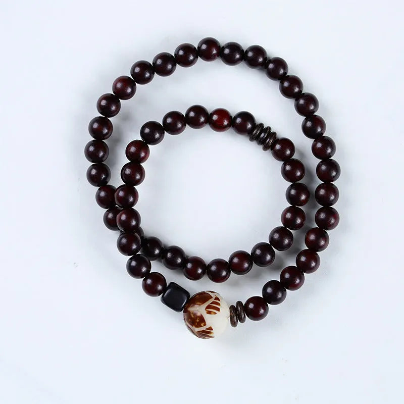 Natural rosewood double-ring bracelet with retro flower design, 10mm size, showing double circle pattern