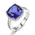 Blue tanzanite gemstone set in a sterling silver women's ring.