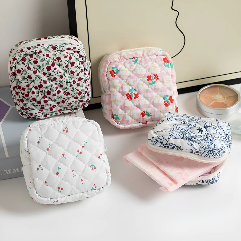 Floral polyester key storage bag with sewing thread detailing in multiple colour patterns