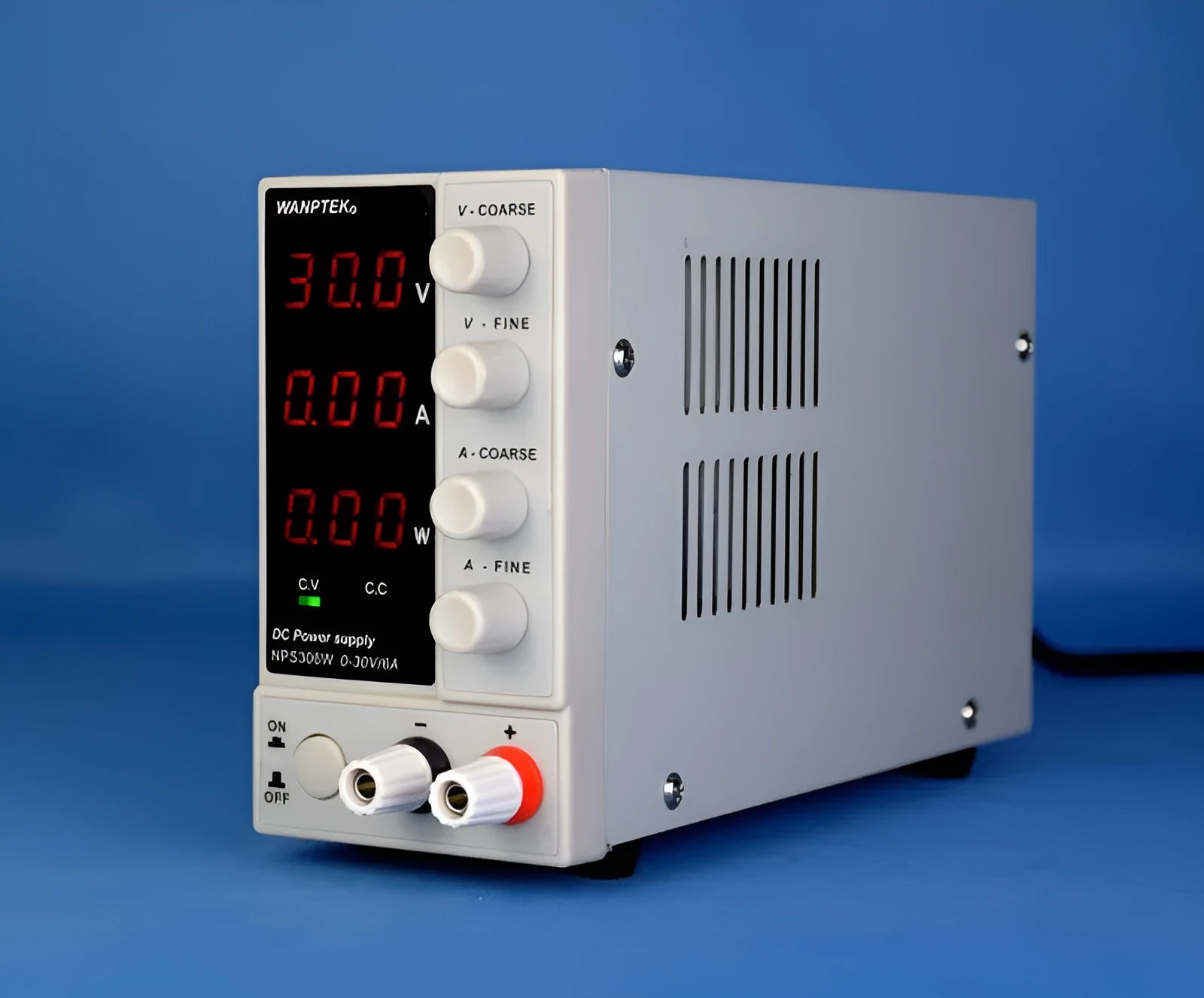 White NPS605W adjustable bench power supply with digital display for electronics testing and repair.