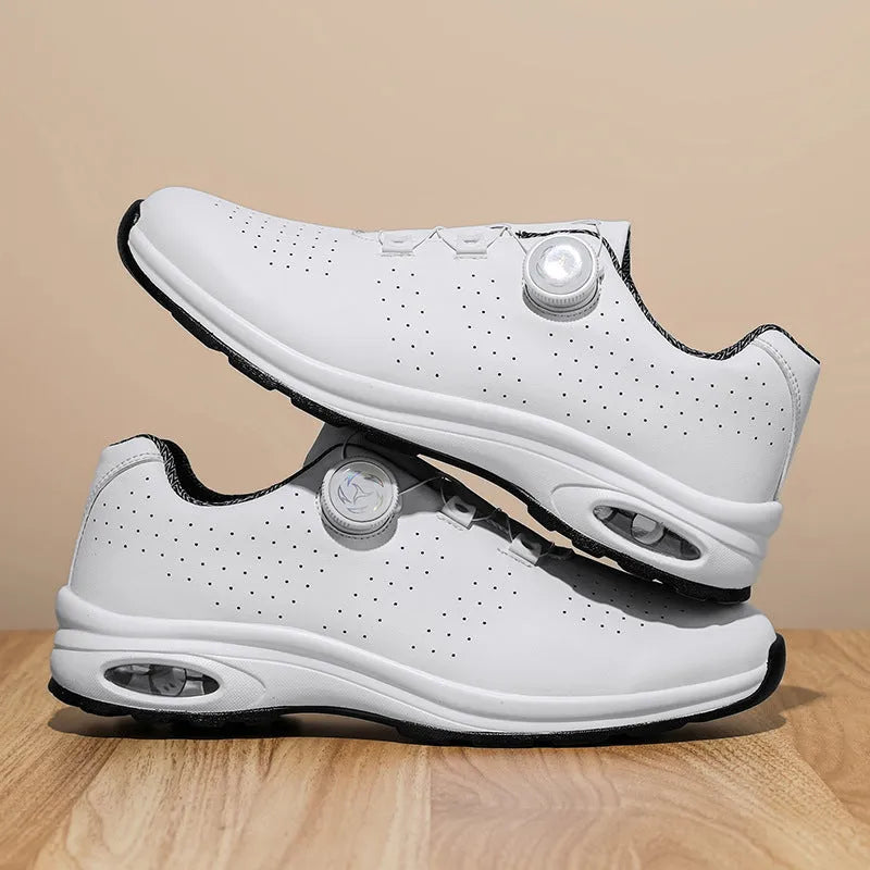 Low top casual shoes with mesh upper and cross strap design in black or white colour options