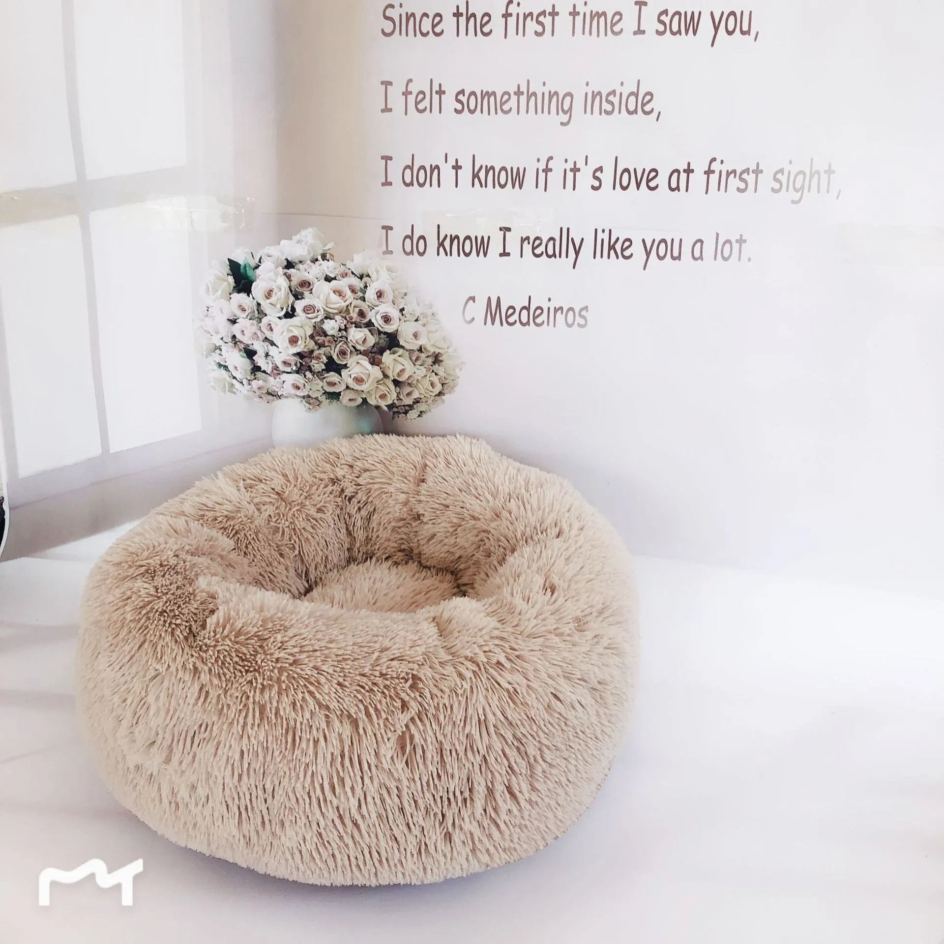 Plush pet nest in apricot colour on floor, soft cloth circular dog bed 40cm diameter indoor use