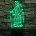 3D LED night light showing illuminated blue dual-ring pattern on acrylic plate with black ABS base.