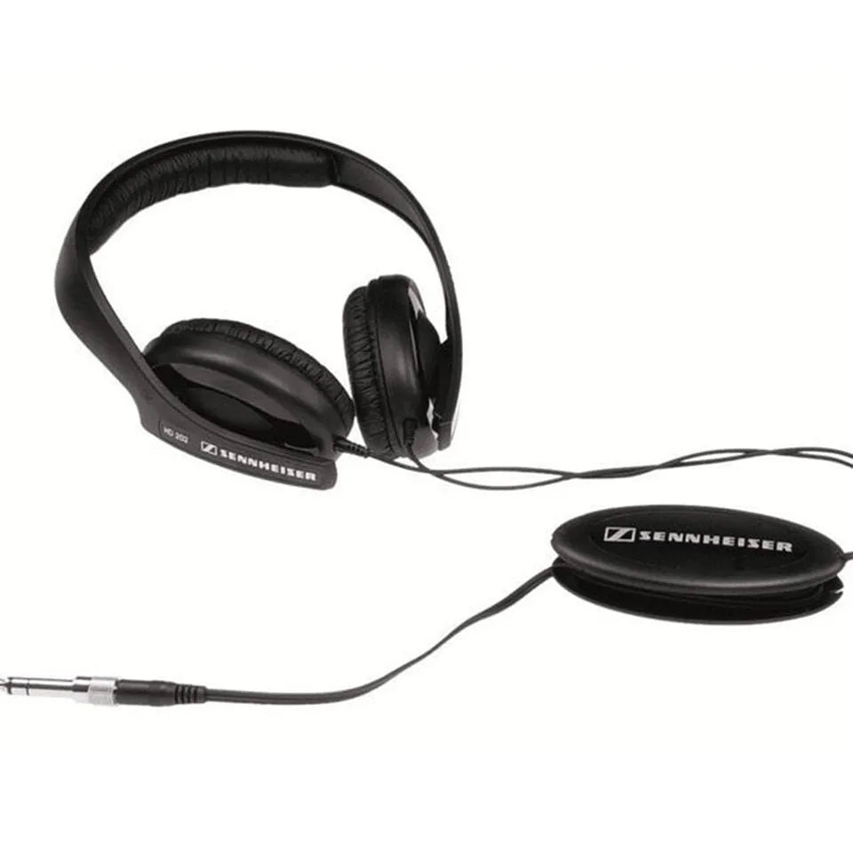 Black over-ear headphones with a headband, large ear cups, a long cable, and a 3.5mm plug.