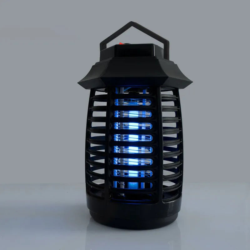 Black electric mosquito killer lamp with UV light and decorative low-glow design.