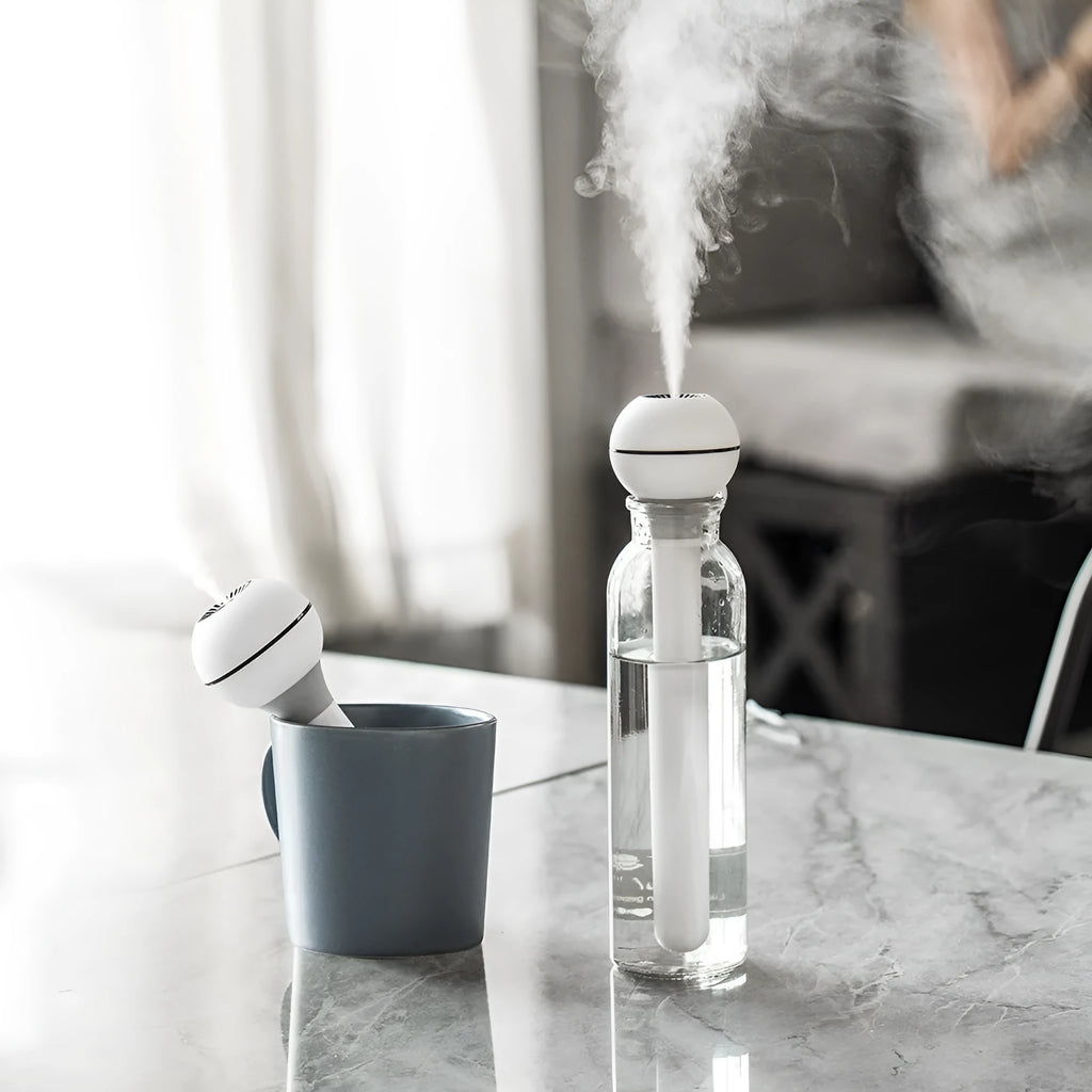 Columnar magic wand humidifier with 1L water tank for small rooms under 10 square metres