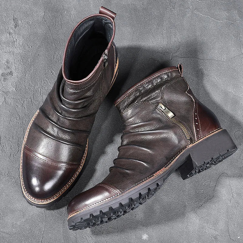 Men's black side-zip cowboy boots with embossed texture and a mid-height horseshoe rubber heel.