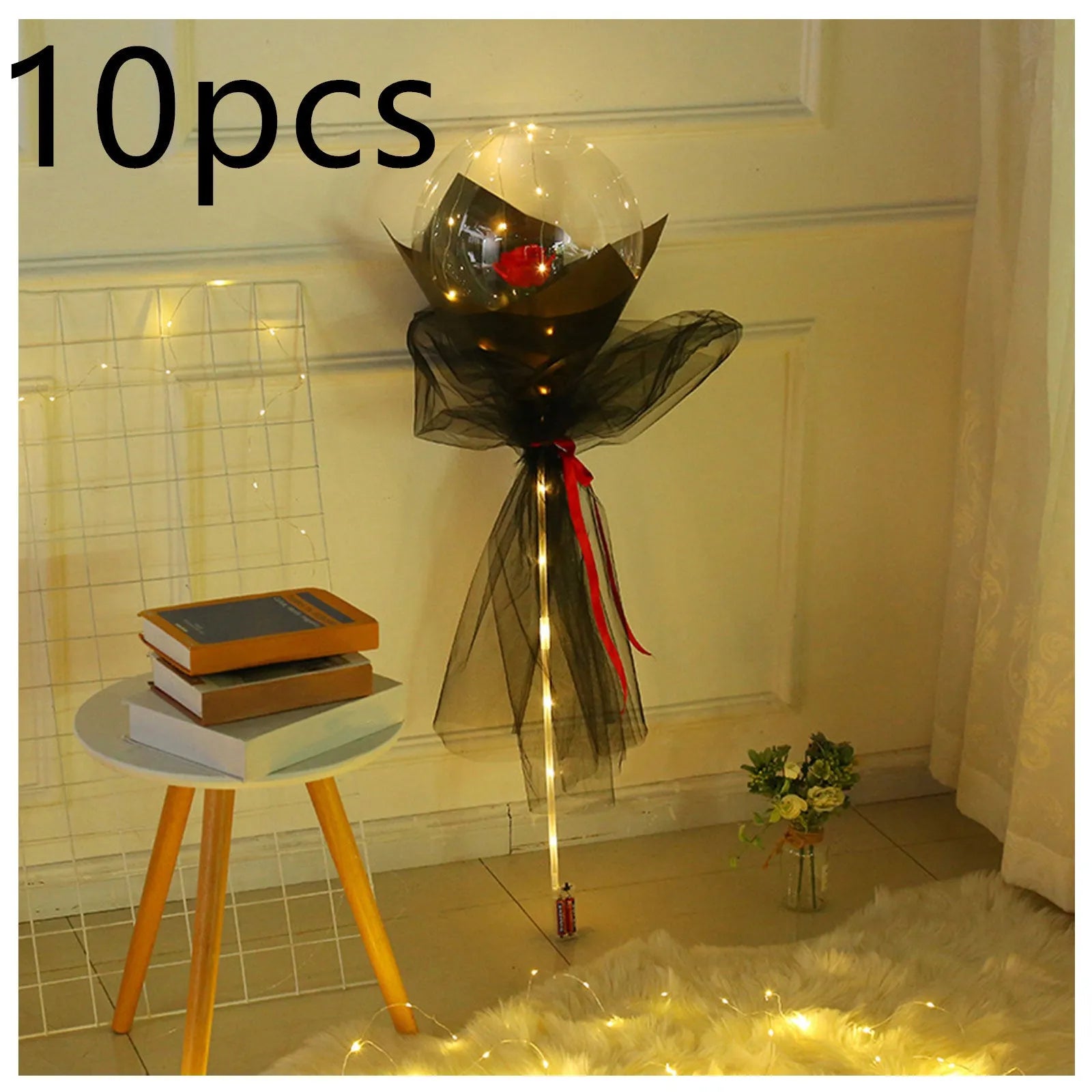 Transparent LED luminous balloon with artificial rose and built-in light, shown as a DIY bouquet kit.