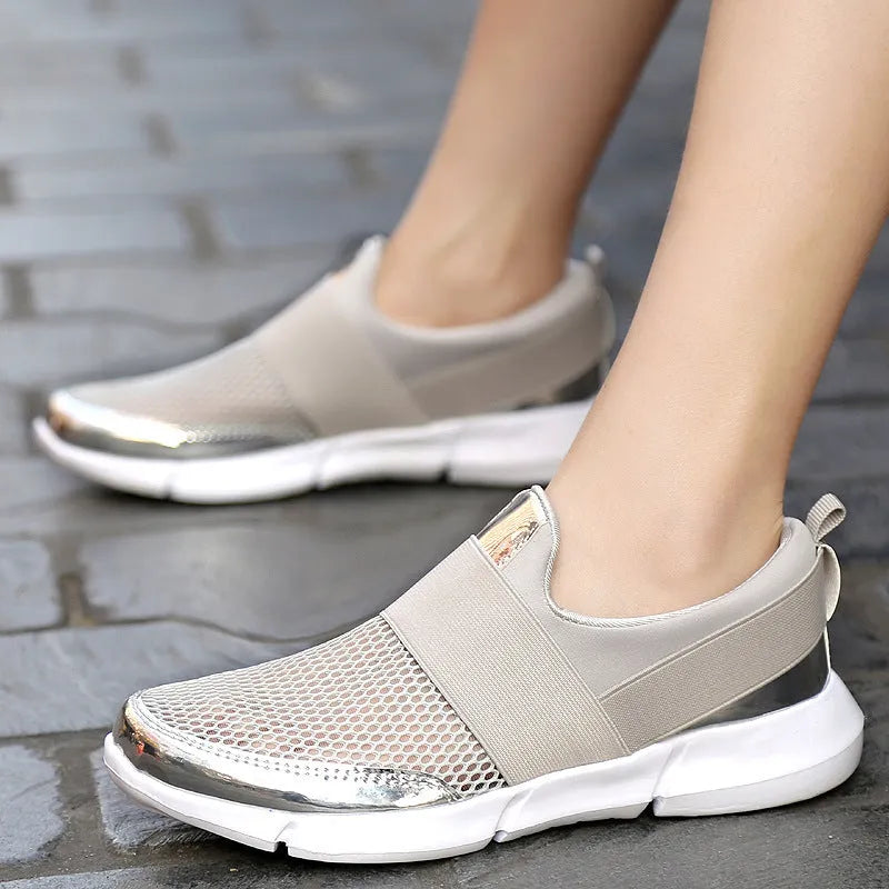 Women's low-top casual sneakers in blue with mesh lining and lightweight construction