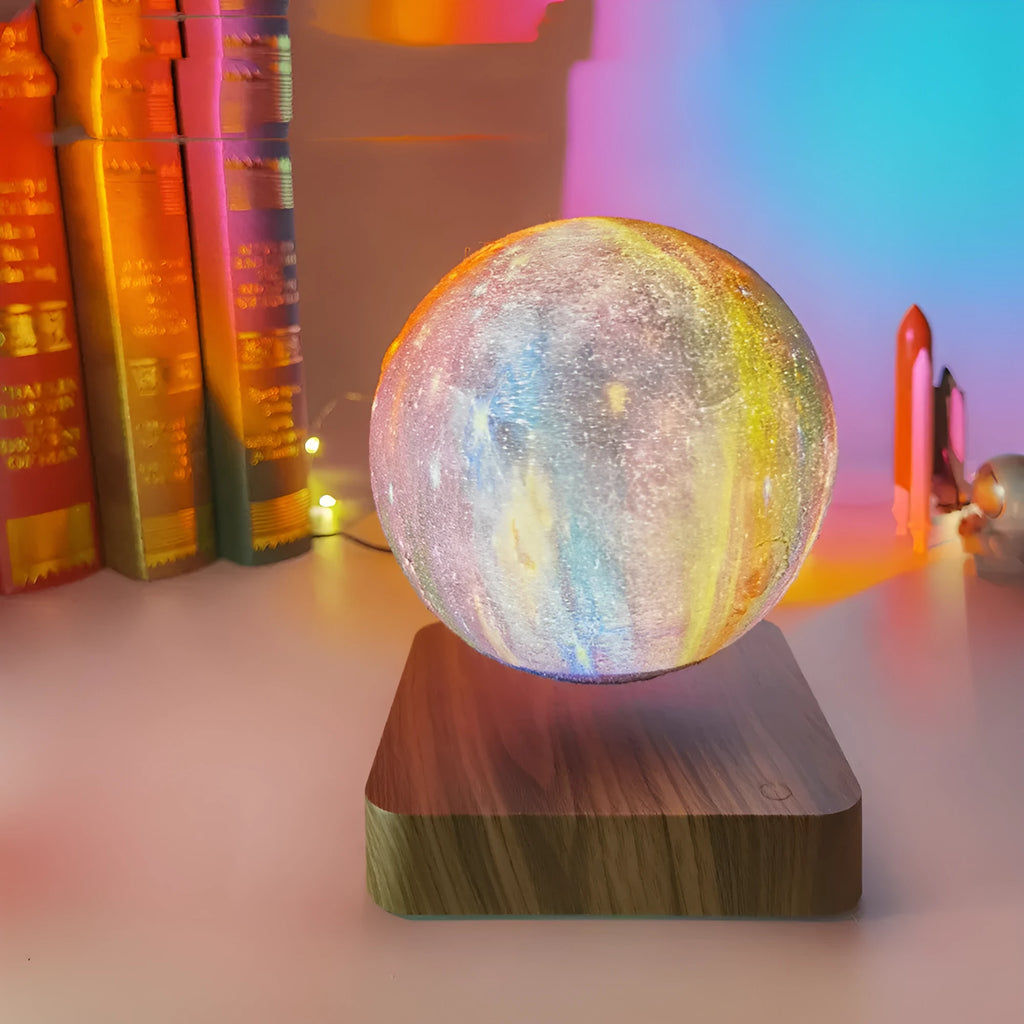 Square walnut coloured magnetic levitation galaxy moon lamp floating above its base