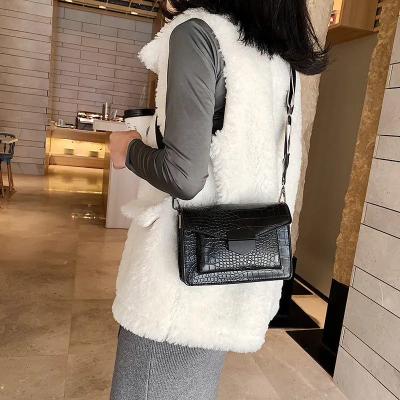 Vintage PU crossbody bag in black, shown with measurements and internal polyester lining