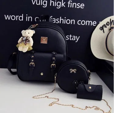 Women's three-piece PU leather bag set showing backpack, shoulder bag, and card holder in matching colour