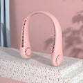 Pink bladeless neck fan being worn, showing soft neckband and compact fan unit.