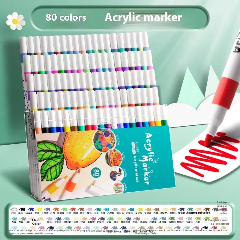 Box of multicoloured acrylic marker pens for student art and painting projects.