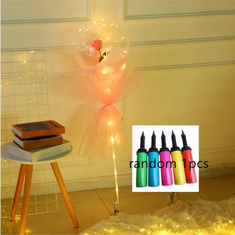 Transparent LED luminous balloon with artificial rose and built-in light, shown as a DIY bouquet kit.