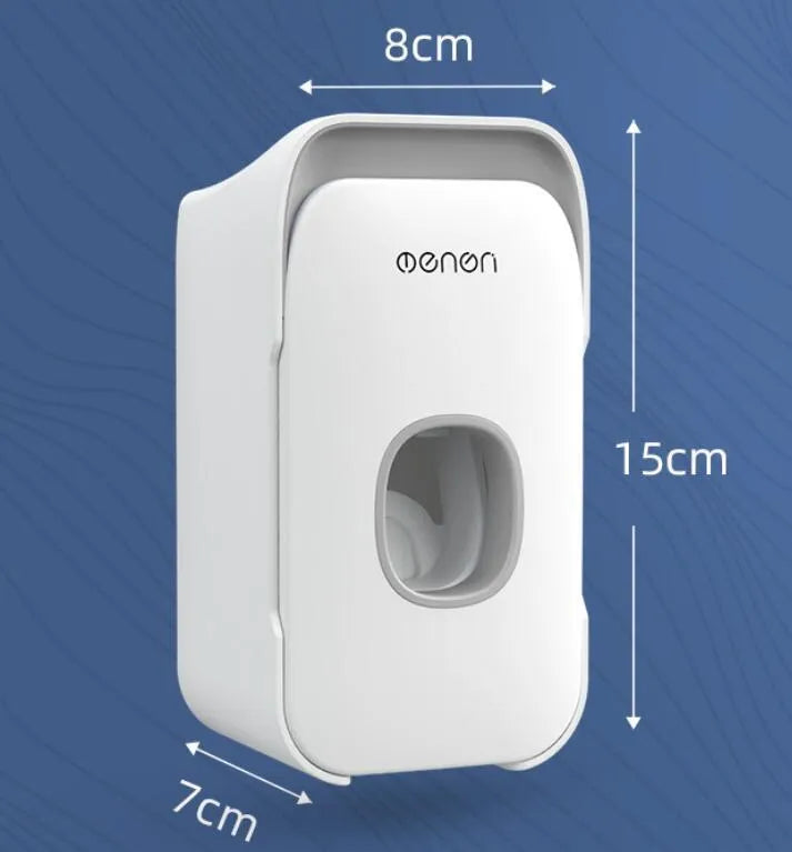 Automatic toothpaste dispenser mounted on bathroom wall in blue colour
