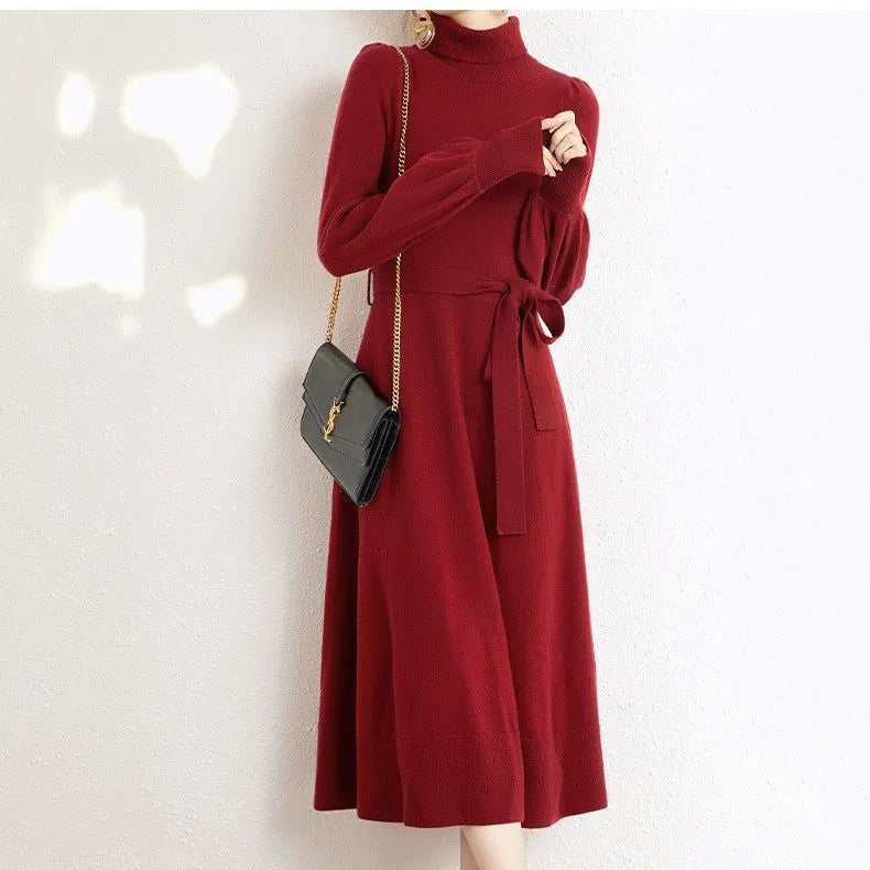 Women's rose red turtleneck long sleeve knit dress with elastic waist and loose mid-length skirt.