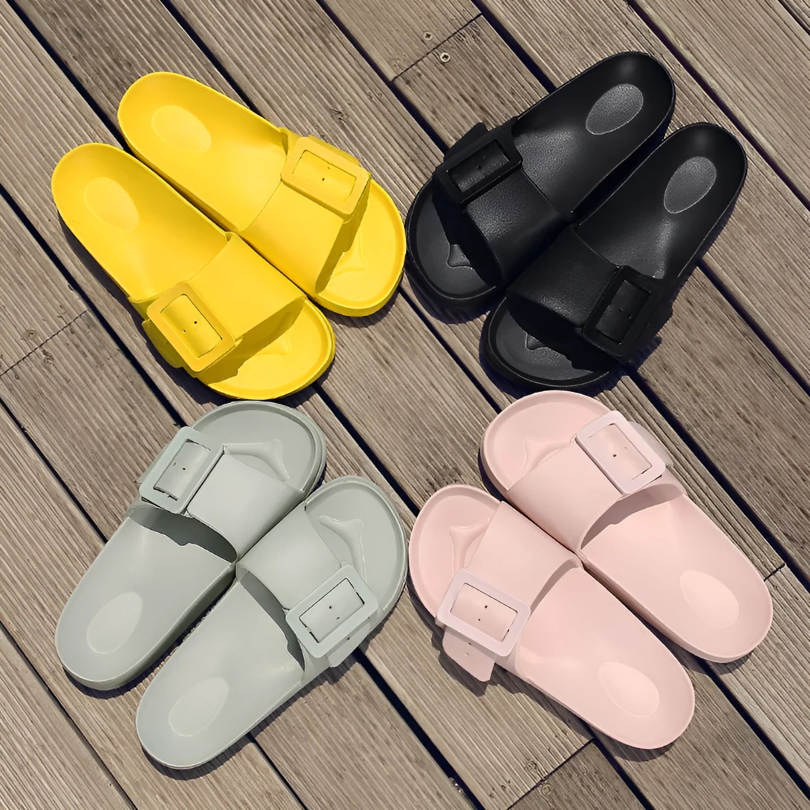 Women's grey blue flip-flop slippers with a buckle strap on a soft EVA sole.