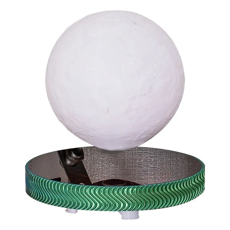 Magnetic suspension moon night lamp floating above base with 3D-printed celestial design