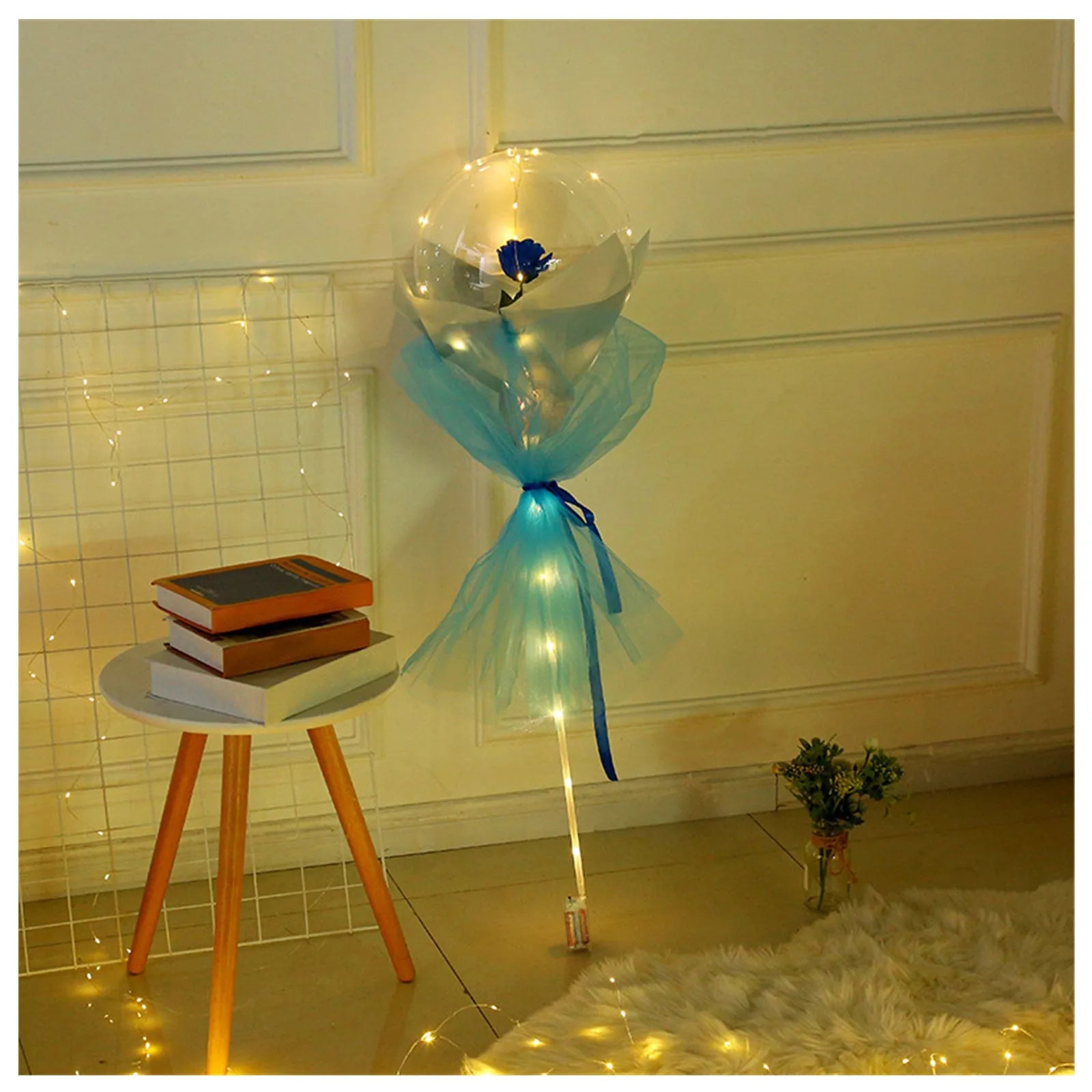 Transparent LED luminous balloon with artificial rose and built-in light, shown as a DIY bouquet kit.