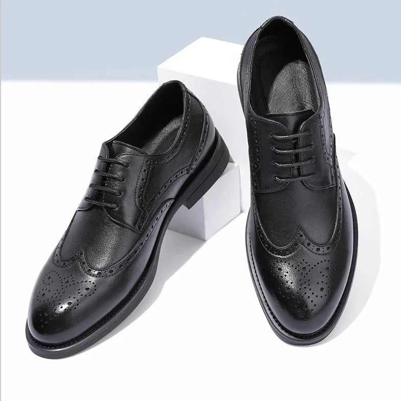 Men's black and brown brogue shoes with traditional wingtip detailing for business wear