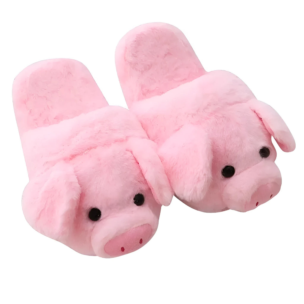 Pink pig design floor slippers with plush lining shown from side view